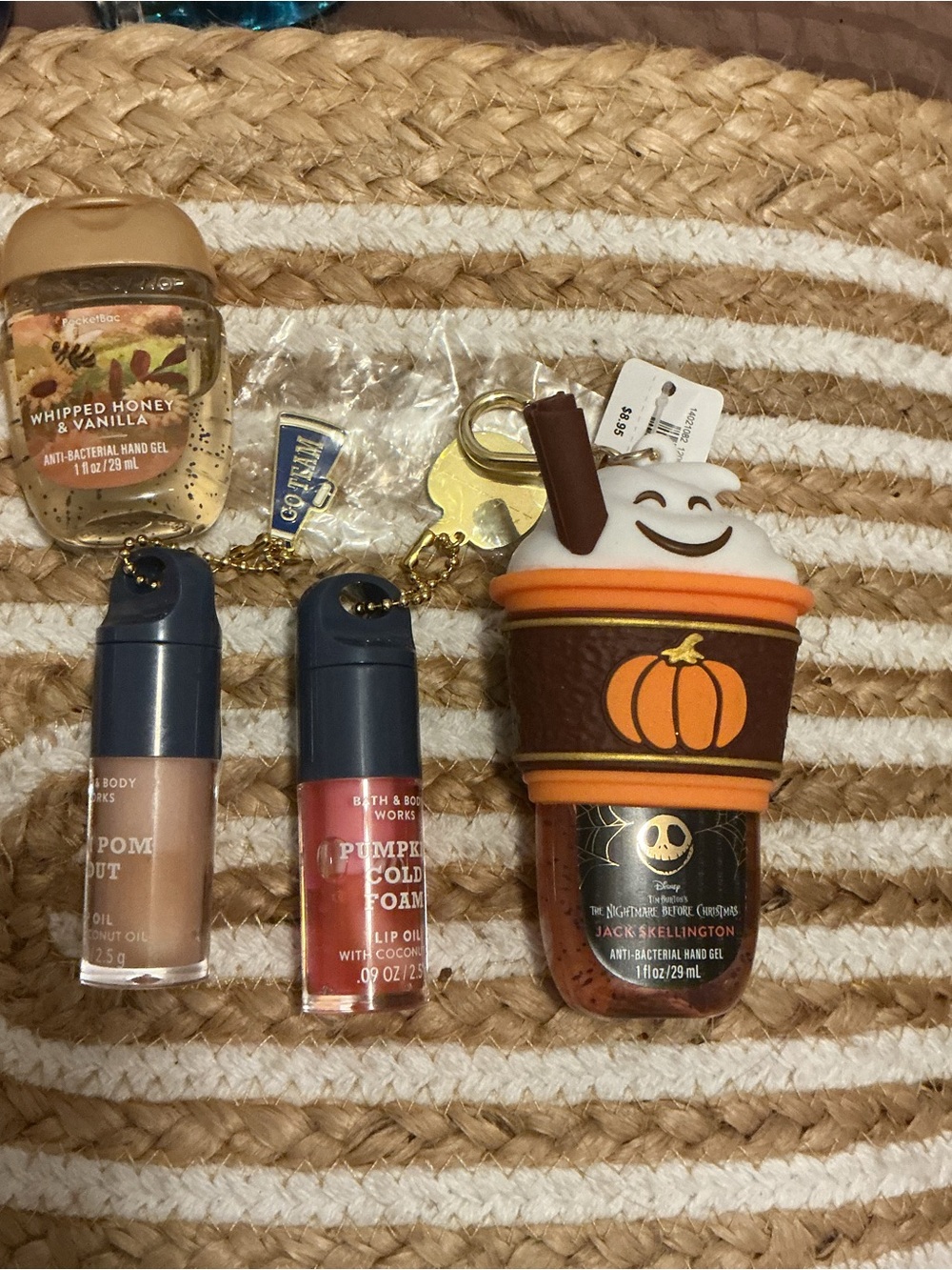 Bath & Body Works Pom Pom Pout Lip Oil in Beige and Coral